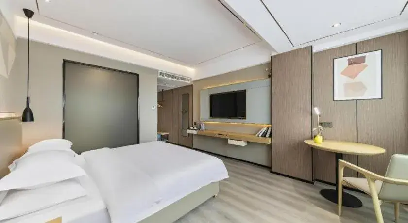 Bed in Borrman Hotel Wanning Wenming Road High-speed Railway Station Bed in Borrman Hotel Wanning Wenming Road High-speed Railway Station