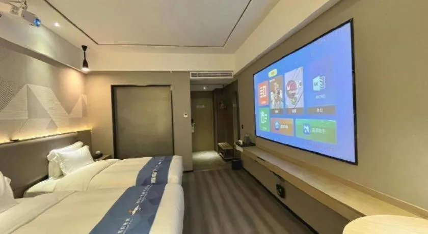 Bed in Borrman Hotel Wanning Wenming Road High-speed Railway Station