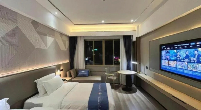 Bed in Borrman Hotel Wanning Wenming Road High-speed Railway Station