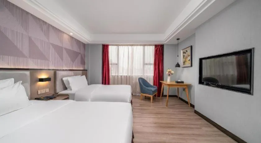 Bed in Borrman Hotel Guangzhou Xinshi Baixin Plaza Qifu Road