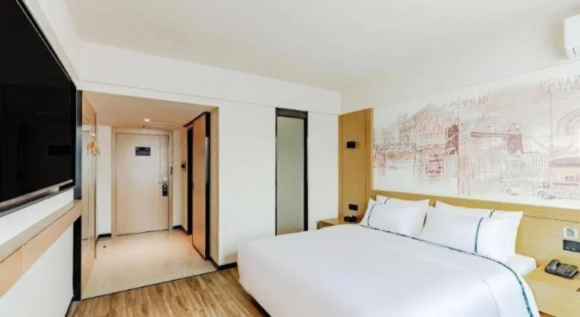 Bed in City Comfort Inn Shaorao Poyang