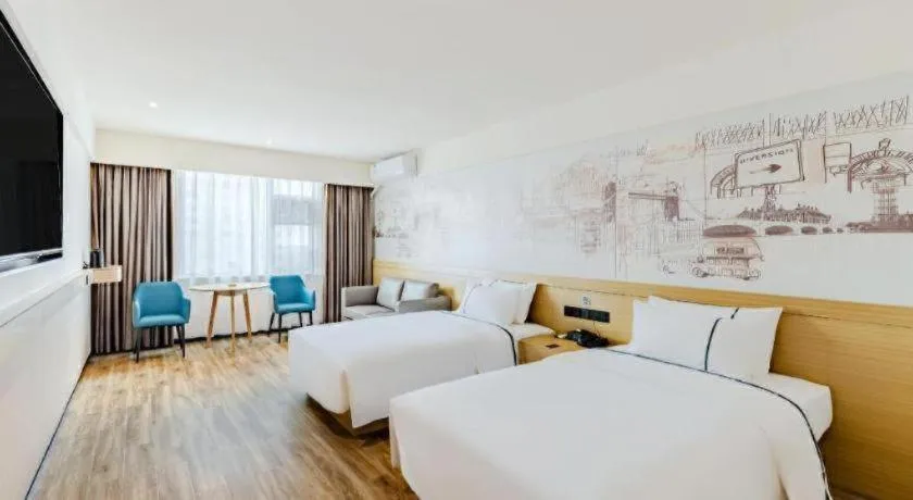 Bed in City Comfort Inn Shaorao Poyang