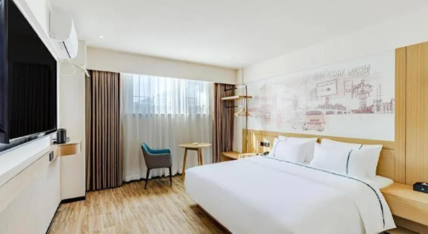 Bed in City Comfort Inn Shaorao Poyang