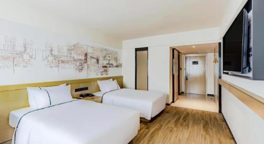 Bed in City Comfort Inn Shaorao Poyang