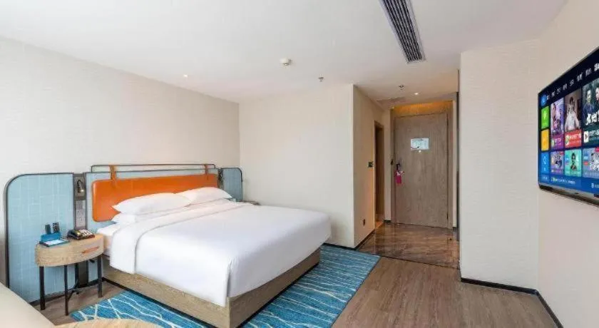Bed in Echarm Hotel Guangzhou North Station Cultural Tourism City