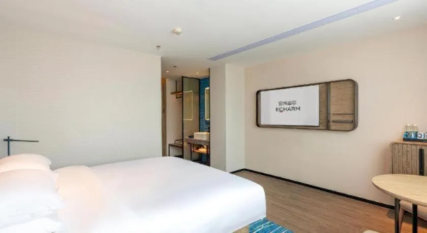 Bed in Echarm Hotel Guangzhou North Station Cultural Tourism City