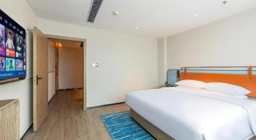 Bed in Echarm Hotel Guangzhou North Station Cultural Tourism City