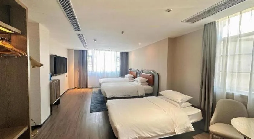 Bed in Echarm Hotel Guangzhou North Station Cultural Tourism City