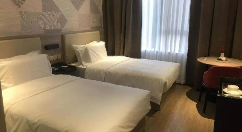 Bed in Borrman Hotel Suzhou Wujiang Zhongshan North Road Pedestrian Street
