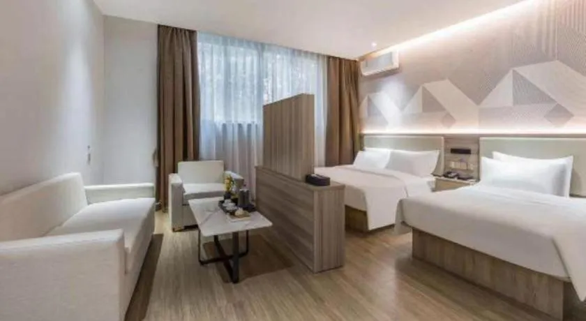 Bed in Borrman Hotel Suzhou Wujiang Zhongshan North Road Pedestrian Street
