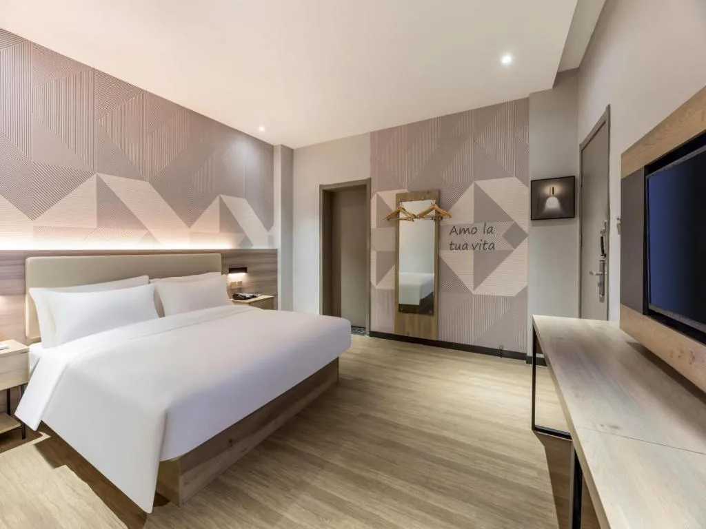 Bed in Borrman Hotel Suzhou Wujiang Zhongshan North Road Pedestrian Street