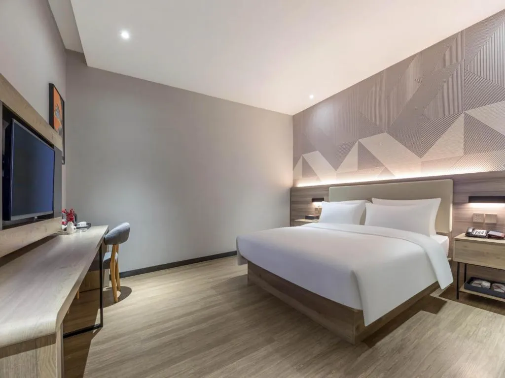 Bed in Borrman Hotel Suzhou Wujiang Zhongshan North Road Pedestrian Street