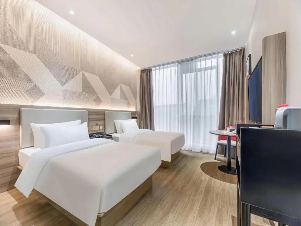 Bed in Borrman Hotel Suzhou Wujiang Zhongshan North Road Pedestrian Street