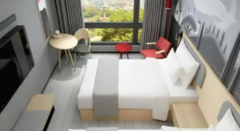 Bed in Borrman Hotel Suzhou Wujiang Zhongshan North Road Pedestrian Street