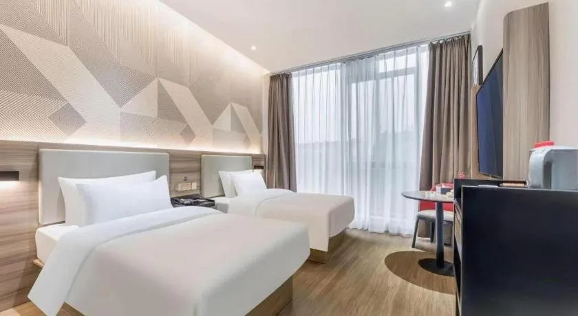 Bed in Borrman Hotel Suzhou Wujiang Zhongshan North Road Pedestrian Street