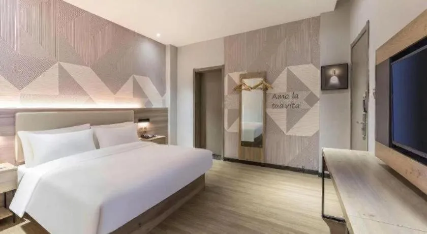 Bed in Borrman Hotel Suzhou Wujiang Zhongshan North Road Pedestrian Street