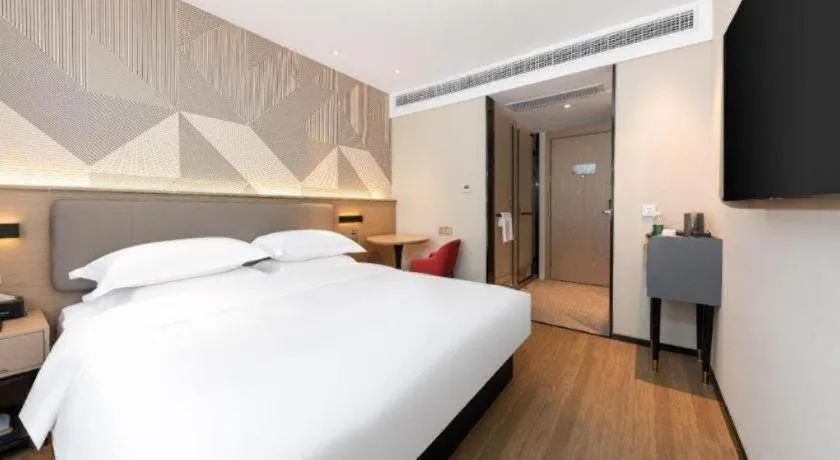 Bed in Borrman Hotel Wuhan First Hospital Hanzheng Street Metro Station