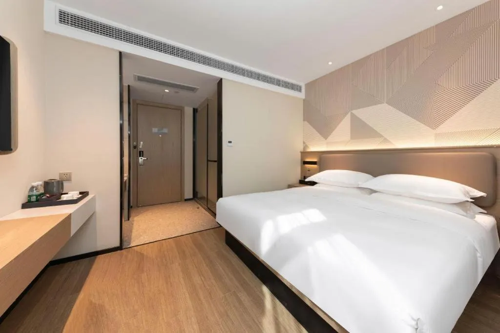 Bed in Borrman Hotel Wuhan First Hospital Hanzheng Street Metro Station