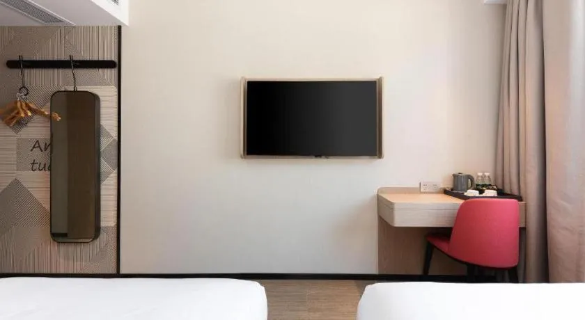 Bed in Borrman Hotel Wuhan First Hospital Hanzheng Street Metro Station
