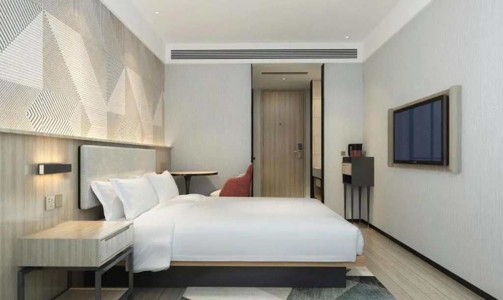 Bed in Borrman Hotel Wuhan First Hospital Hanzheng Street Metro Station