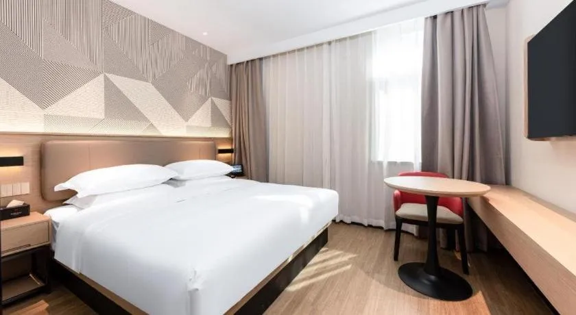 Bed in Borrman Hotel Wuhan First Hospital Hanzheng Street Metro Station