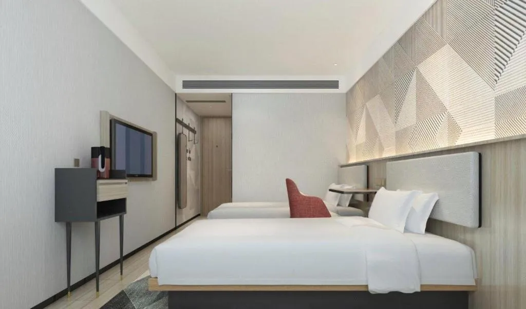 Bed in Borrman Hotel Wuhan First Hospital Hanzheng Street Metro Station