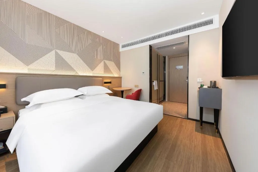 Bed in Borrman Hotel Wuhan First Hospital Hanzheng Street Metro Station