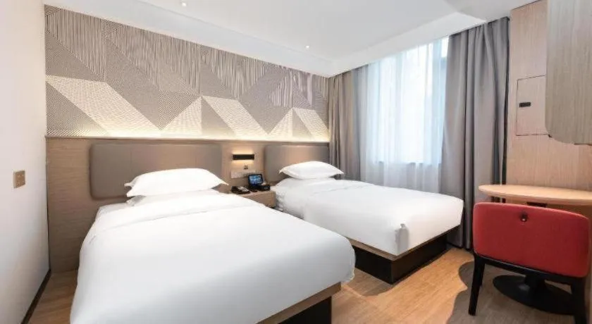 Bed in Borrman Hotel Wuhan First Hospital Hanzheng Street Metro Station