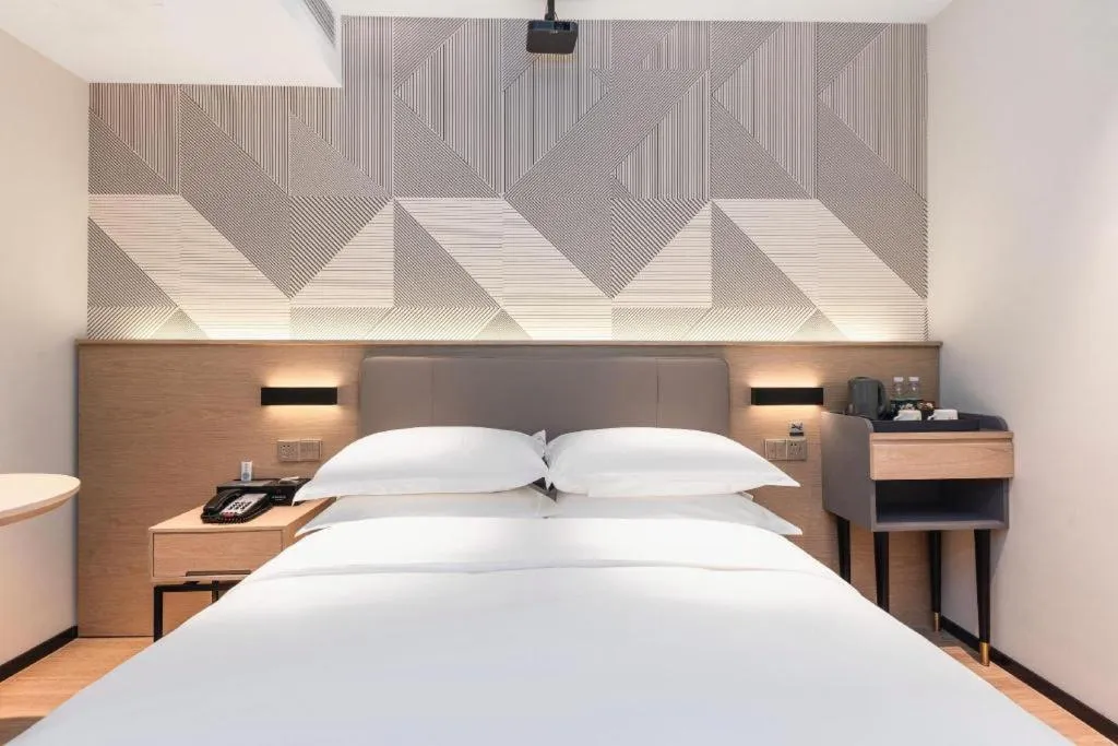 Bed in Borrman Hotel Wuhan First Hospital Hanzheng Street Metro Station