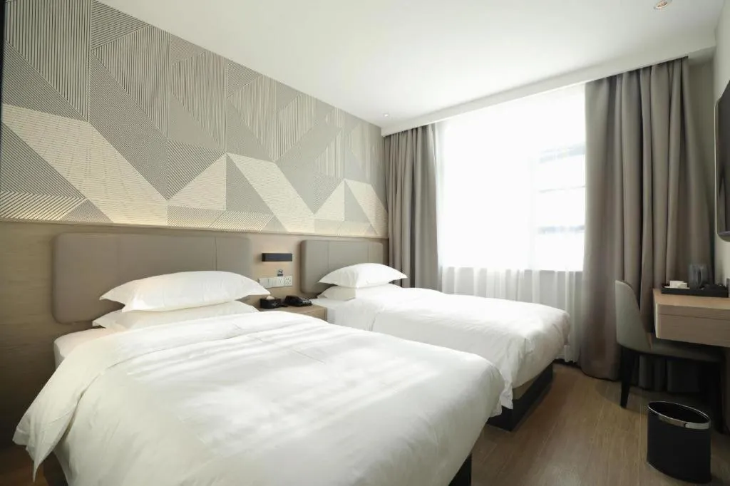 Bed in Borrman Hotel Wuhan First Hospital Hanzheng Street Metro Station