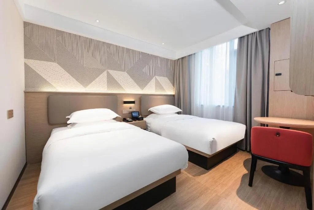 Bed in Borrman Hotel Wuhan First Hospital Hanzheng Street Metro Station