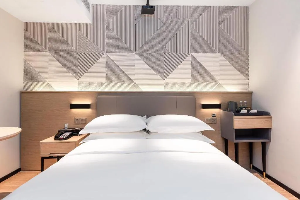 Bed in Borrman Hotel Wuhan First Hospital Hanzheng Street Metro Station