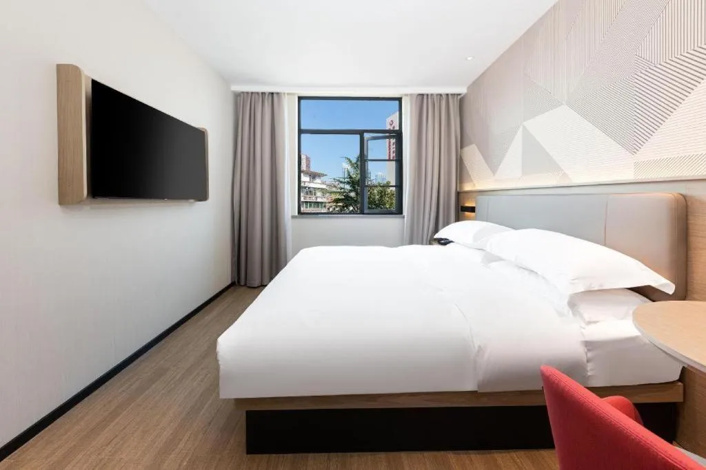 Bed in Borrman Hotel Wuhan First Hospital Hanzheng Street Metro Station