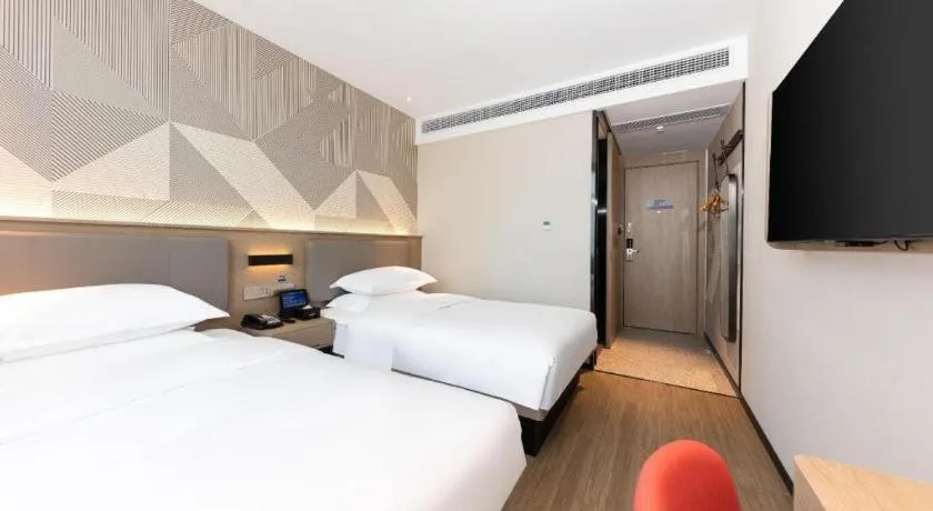 Bed in Borrman Hotel Wuhan First Hospital Hanzheng Street Metro Station