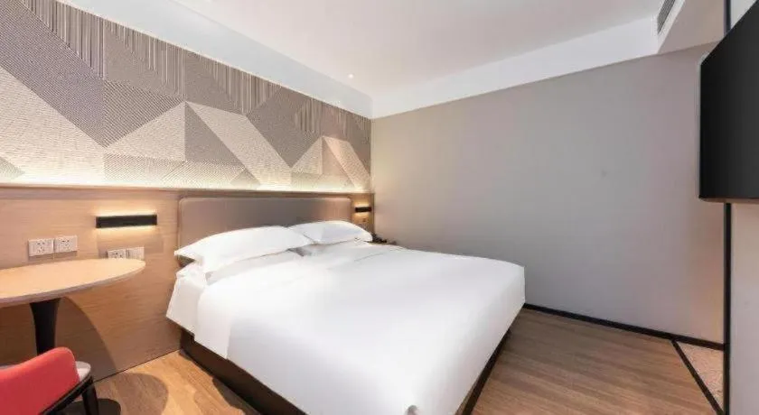 Bed in Borrman Hotel Wuhan First Hospital Hanzheng Street Metro Station