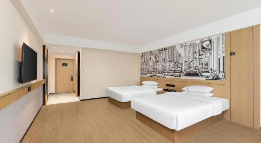 Bed in City Comfort Inn Hotel Wuhan Jiufeng Mountain Forest Park