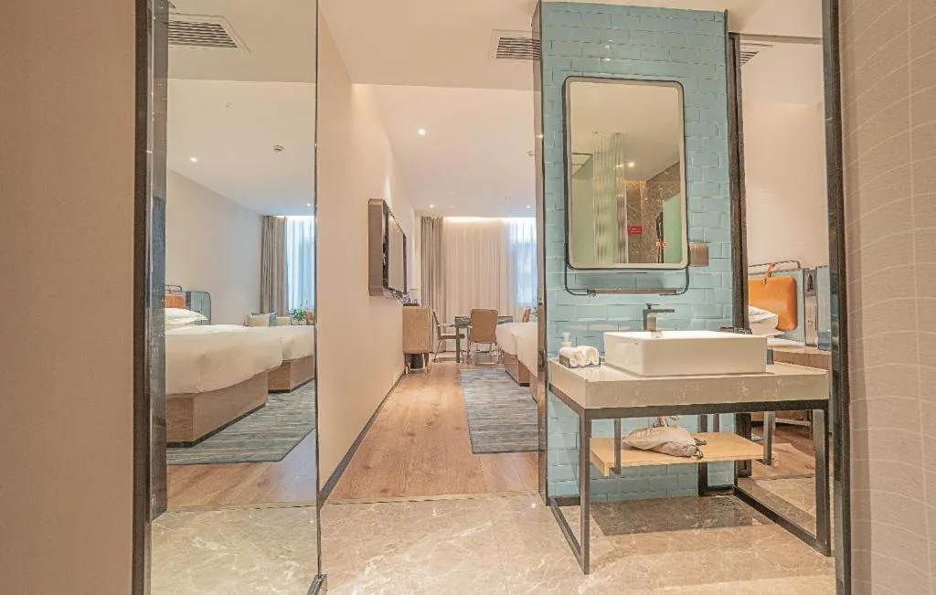 Bed in Echarm Hotel Zigong Machishui Wanda Plaza