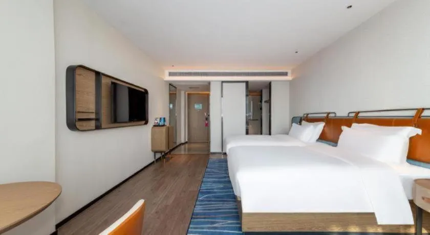 Bed in Echarm Hotel Zigong Machishui Wanda Plaza