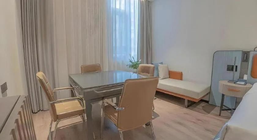 Bed in Echarm Hotel Zigong Machishui Wanda Plaza