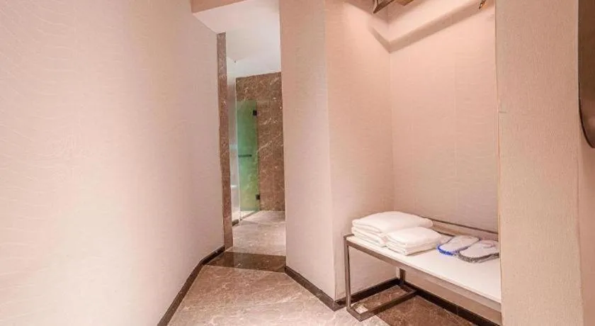 Bed in Echarm Hotel Zigong Machishui Wanda Plaza