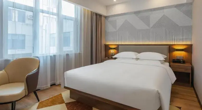 Bed in Borrman Hotel Zoucheng Huamaowan Mall Bed in Borrman Hotel Zoucheng Huamaowan Mall