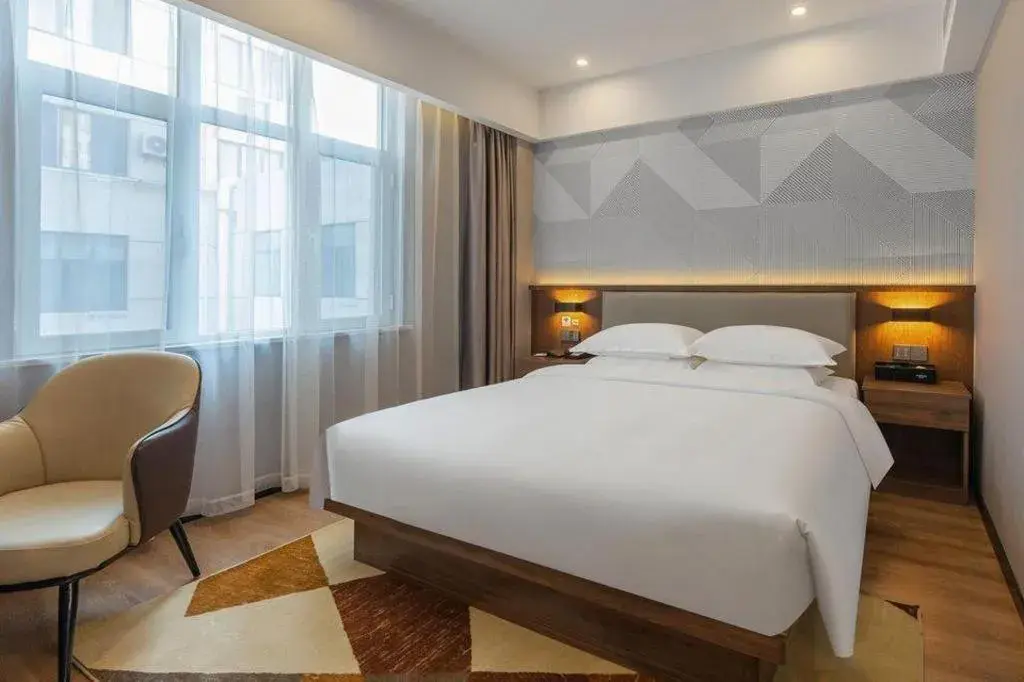 Bed in Borrman Hotel Zoucheng Huamaowan Mall Bed in Borrman Hotel Zoucheng Huamaowan Mall