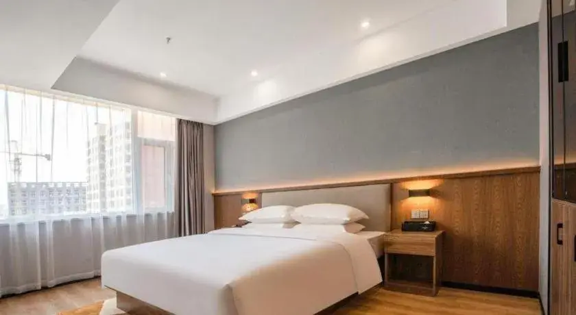 Bed in Borrman Hotel Zoucheng Huamaowan Mall Bed in Borrman Hotel Zoucheng Huamaowan Mall