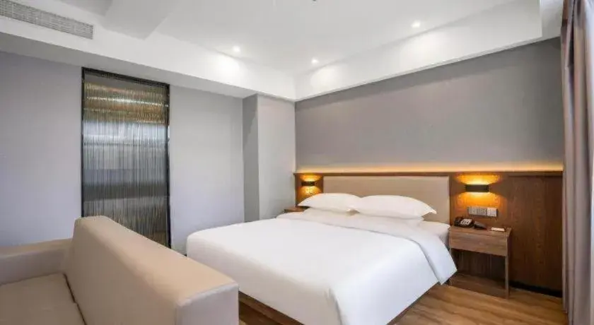 Bed in Borrman Hotel Zoucheng Huamaowan Mall Bed in Borrman Hotel Zoucheng Huamaowan Mall