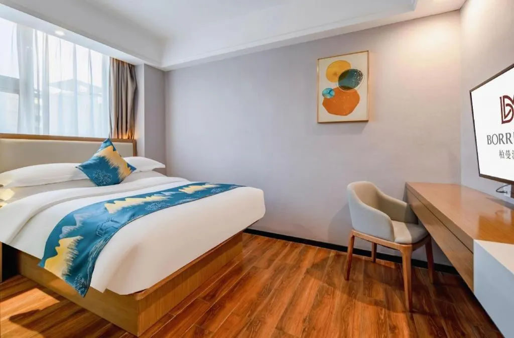 Bed in Borrman Hotel Nanning Anji Passenger Station Xijin Metro Station