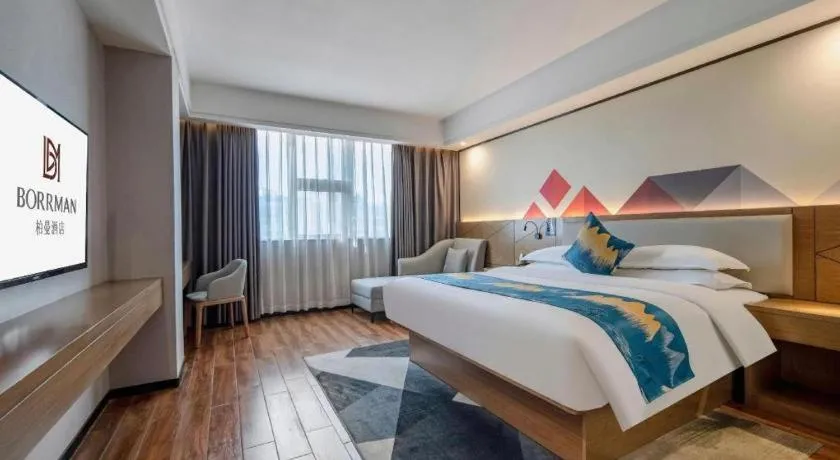 Bed in Borrman Hotel Nanning Anji Passenger Station Xijin Metro Station