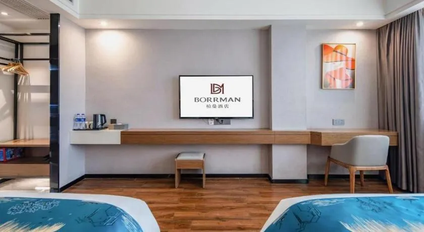 Bed in Borrman Hotel Nanning Anji Passenger Station Xijin Metro Station
