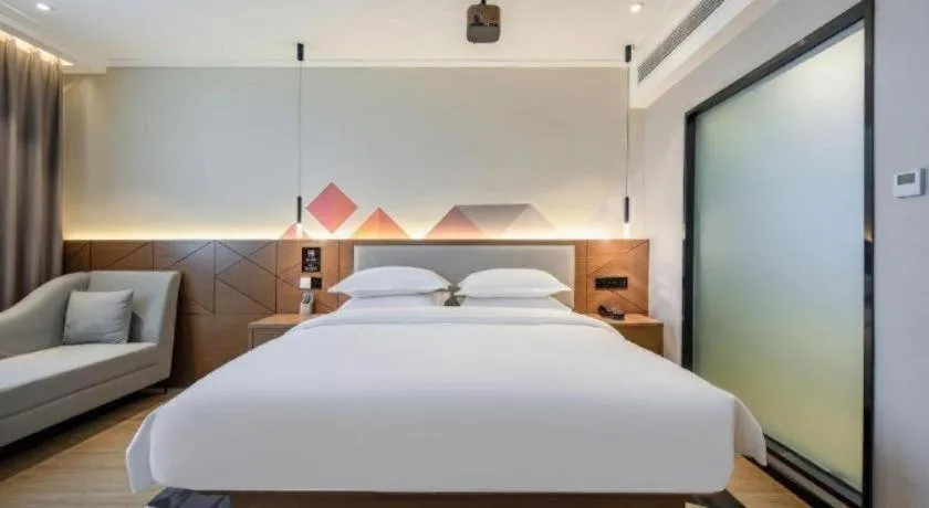 Bed in Borrman Hotel Nanning Anji Passenger Station Xijin Metro Station