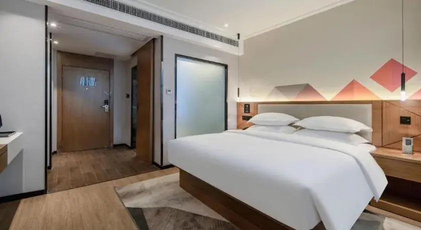 Bed in Borrman Hotel Nanning Anji Passenger Station Xijin Metro Station Bed in Borrman Hotel Nanning Anji Passenger Station Xijin Metro Station