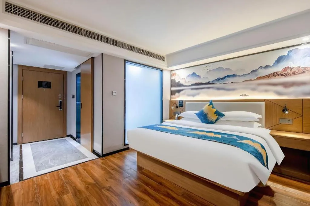 Bed in Borrman Hotel Nanning Anji Passenger Station Xijin Metro Station